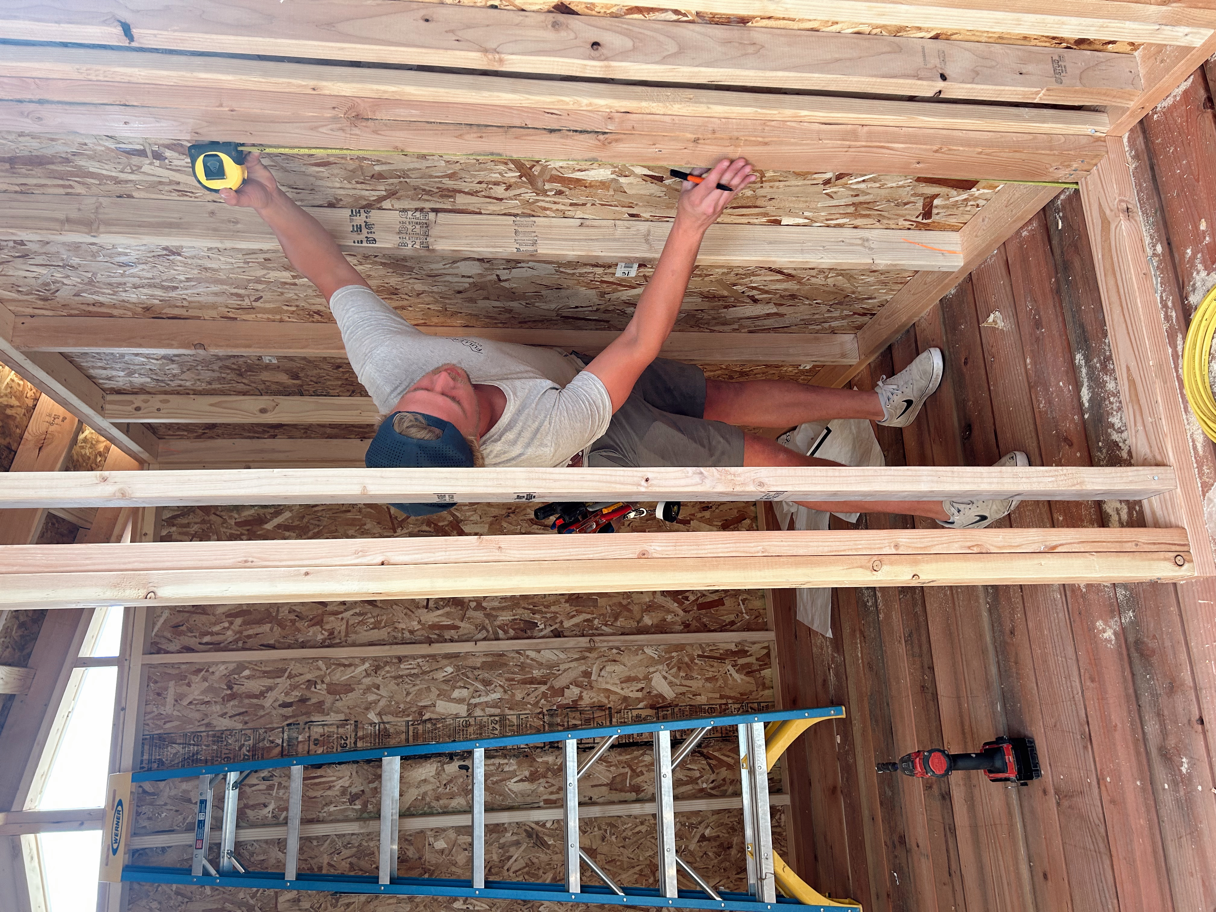 Nova Electric master electrician Dane at work on a Flathead Valley new build